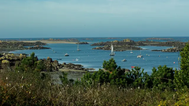 Bay with several boats and rocky islands