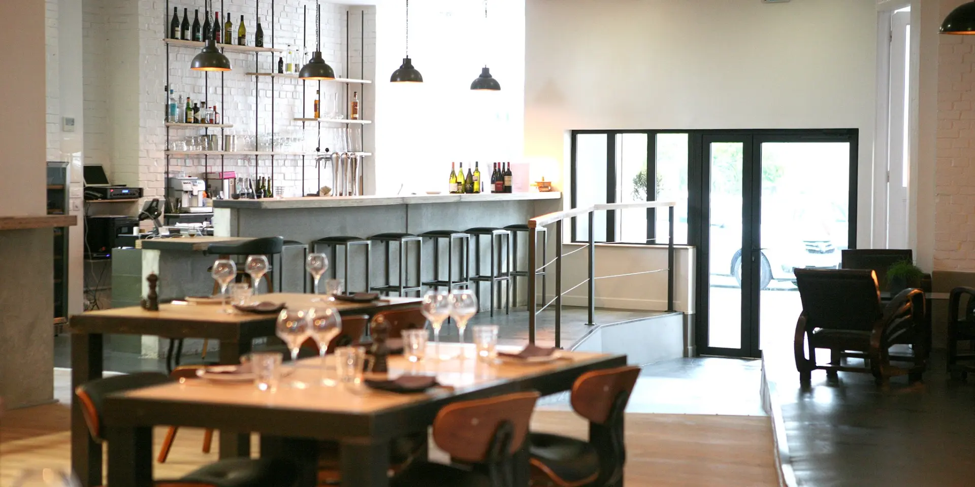 Interior of a restaurant with neatly arranged tables and chairs