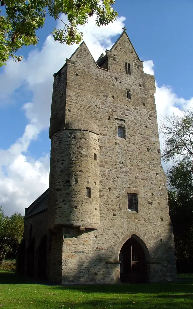 Medieval stone tower with an arched entrance