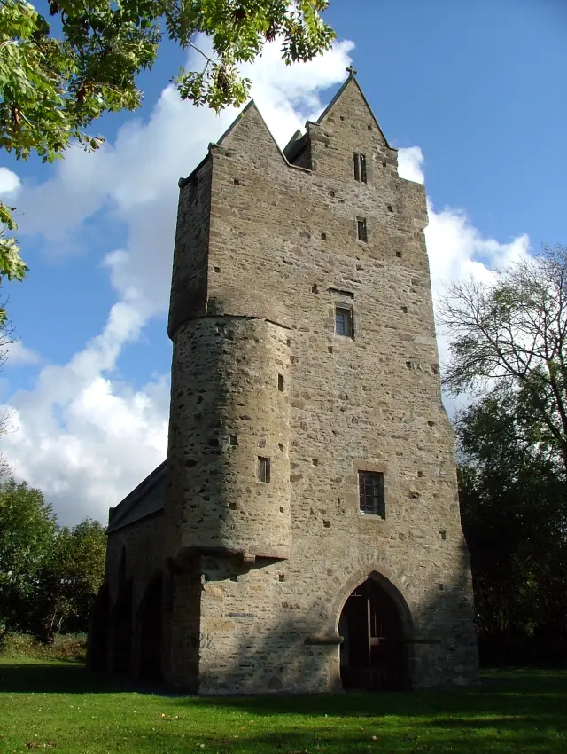 Medieval stone tower with an arched entrance
