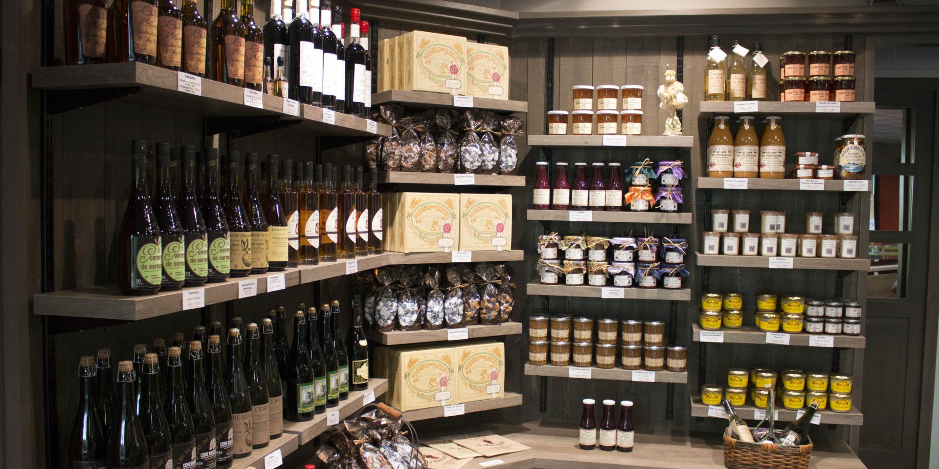 Shelves filled with bottles of wine and food products