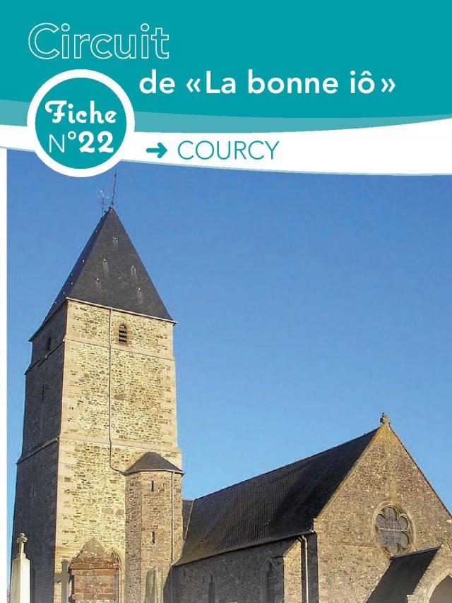Église de Courcy avec un ciel bleu clair