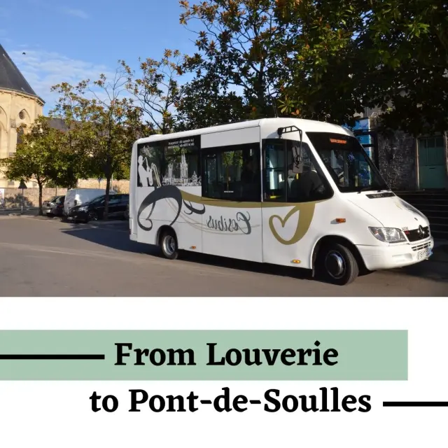 White minibus with logo and illegible text