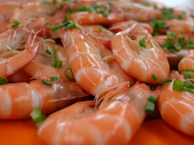 Fresh shrimp garnished with herbs