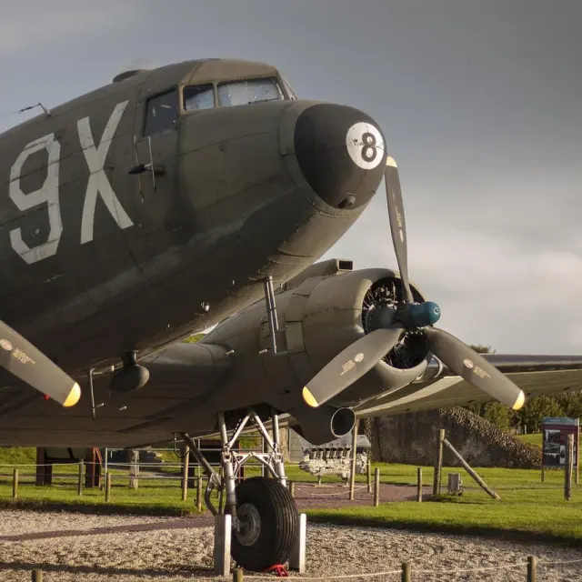 Military aircraft displayed outdoors with the markings 9X and 8