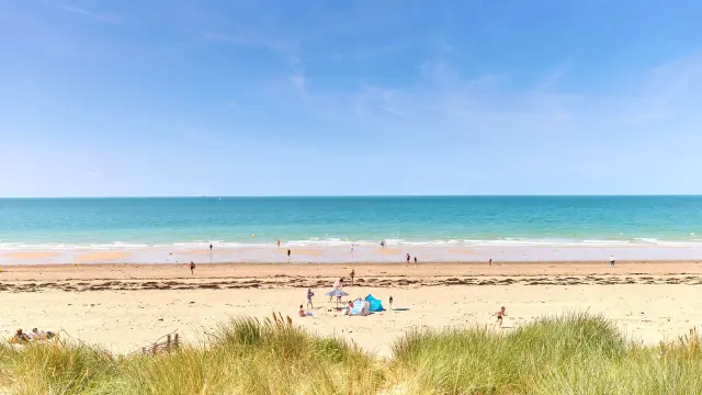 People enjoying a sunny day at the beach
