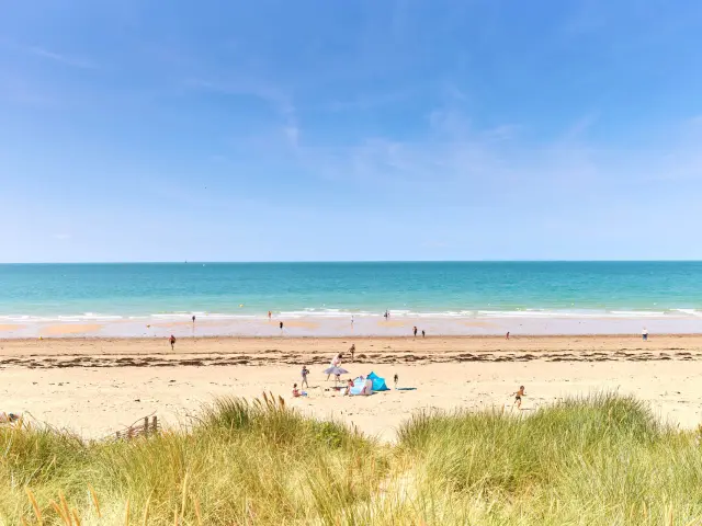 People enjoying a sunny day at the beach
