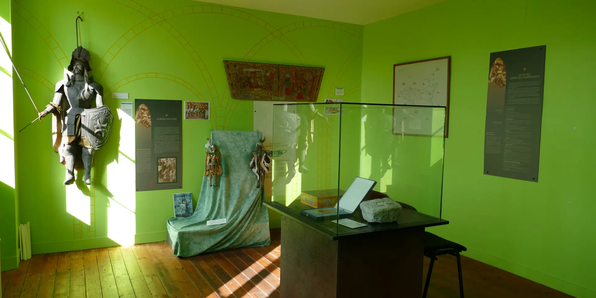 Exhibition room with historical artifacts and information panels