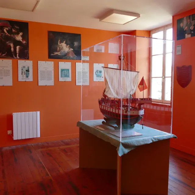 Historical ship model under glass case